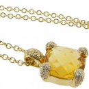 A 18k Yellow Gold Citrine and Brilliant Cut Diamond Pendant. A 18k Yellow Gold Citrine and Brilliant Cut Diamond Pendant.