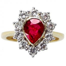Pear shape Ruby & Diamond Cluster ring. 18 carat Gold.