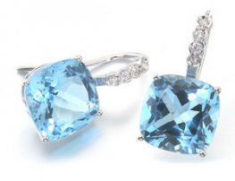 A pair of Blue Topaz and Diamond Earrings white gold.