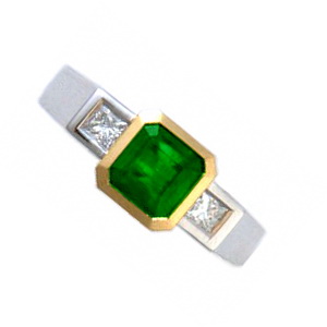 An Emerald-Cut Emerald & Diamond Three Stone Ring. - Click Image to Close