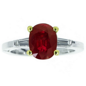 18k Ruby Solitaire ring with Baguette Diamond shoulders.