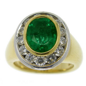 Bold Oval Emerald and Diamond Cluster Ring. 18carat Gold - Click Image to Close