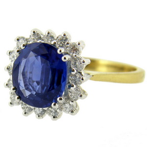 Stunning Cornflower Blue Cushion cut Sapphire and Diamond Ring.