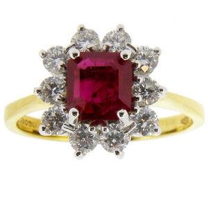 A Traditional Octagon Ruby and Diamond Cluster Ring. 18K. - Click Image to Close