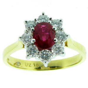 Entrancing Oval Ruby and Diamond Cluster Ring. 18ct Gold - Click Image to Close