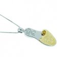 An 18 carat gold Diamond Slipper Shoe Pendant.18ct chain.