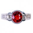 A White Gold Oval Ruby and Diamond Single Stone Ring. 18K.