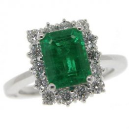Emerald Cut Emerald and Diamond Cluster Ring. 18ct White Gold.