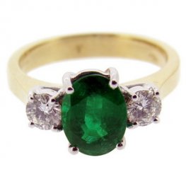 Simple Oval Emerald and Diamond Trilogy Ring.