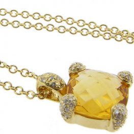 A 18k Yellow Gold Citrine and Brilliant Cut Diamond Pendant.