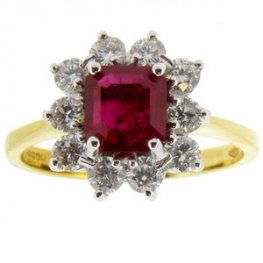 A Traditional Octagon Ruby and Diamond Cluster Ring. 18K.
