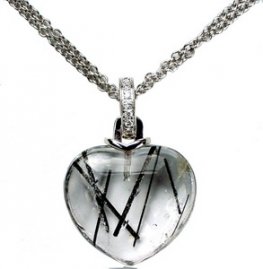 A Cabochon Heart shape Tourmalated Quartz and Diamond Pendant.