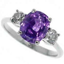 Purple Sapphire and Diamond Three Stone Ring. 18ct WG
