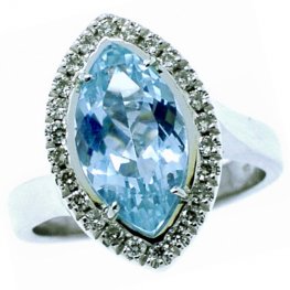A Marquise Cut Aquamarine and Diamond Ring. 18 carat Gold.