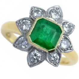 Octagonal Emerald and Diamond Floral Cluster Ring.