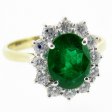 18k gold Columbian Emerald Ring set with Diamonds as a Cluster.