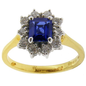 Emerald cut Sapphire and Diamond Traditonal Cluster Ring.